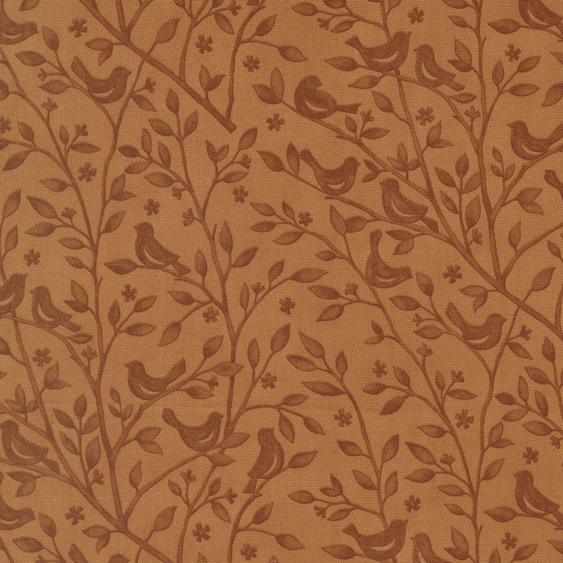 Burnt sienna fabric swatch with a tonal pattern of leafy branches with birds perched atop them.