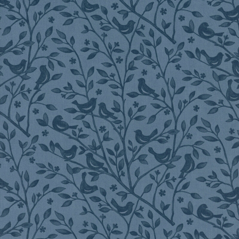 Cadet blue fabric swatch with a tonal pattern of leafy branches with birds perched atop them.