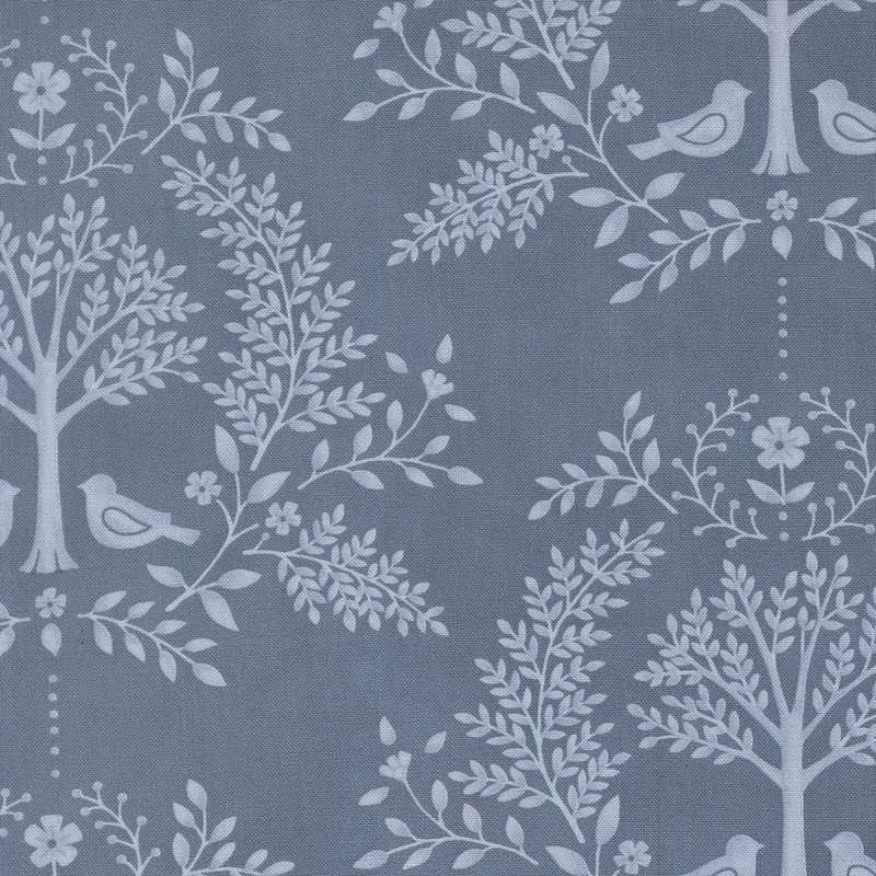 Cadet blue fabric with a tonal light blue damask design featuring birds, trees, and leaves.