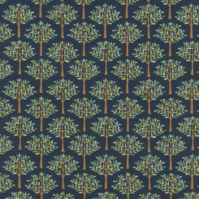 Navy blue fabric swatch with rows of golden brown trees full of leaves in many shades of green.