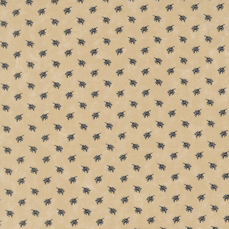A mottled tan fabric with dark blue rosebud sprays. 