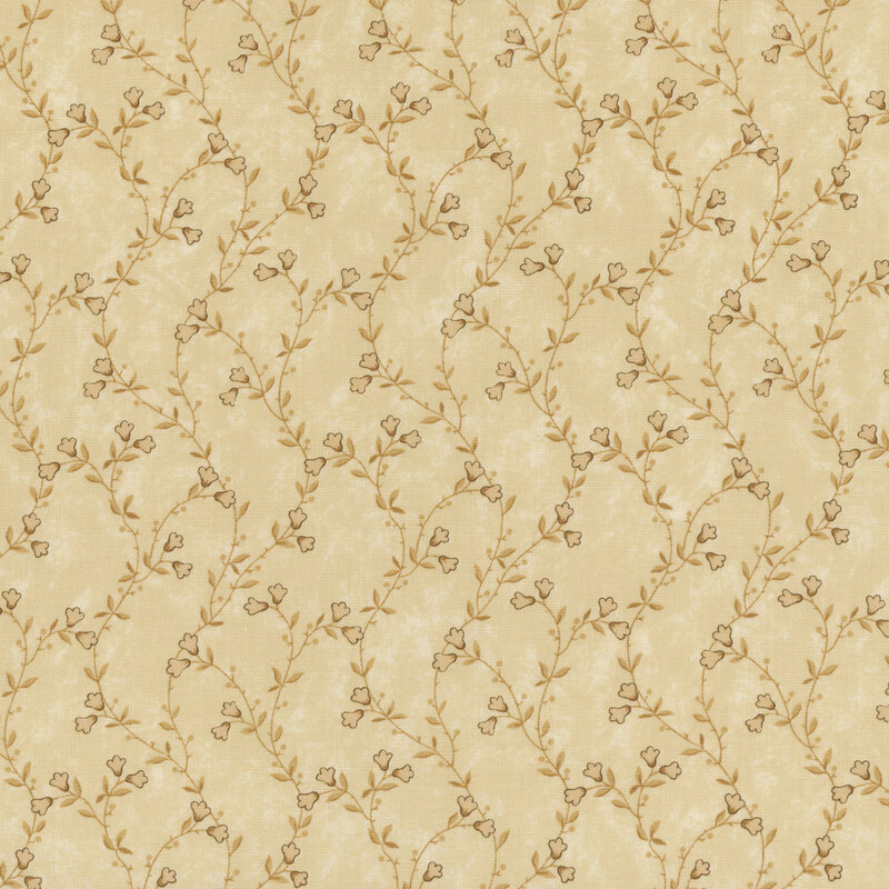 A mottled tan fabric featuring delicate tonal vines and flowers. 