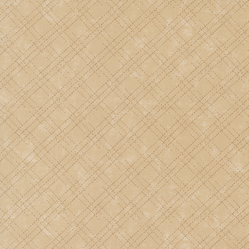 A mottled tan fabric with a tonal stitched plaid design. 