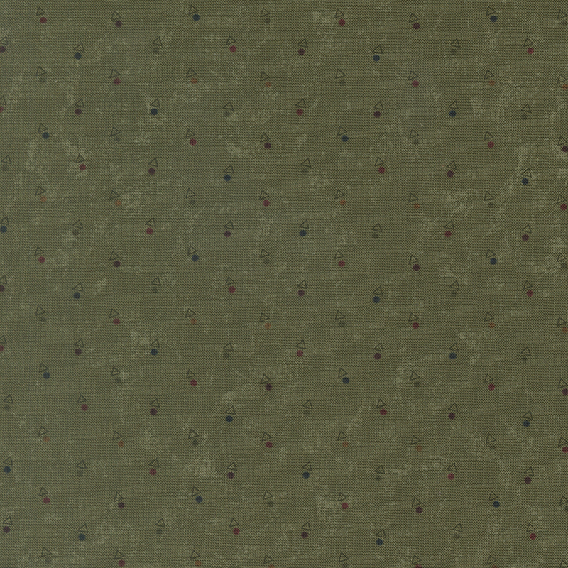 A mottled grass green fabric with triangles and multicolored dots. 