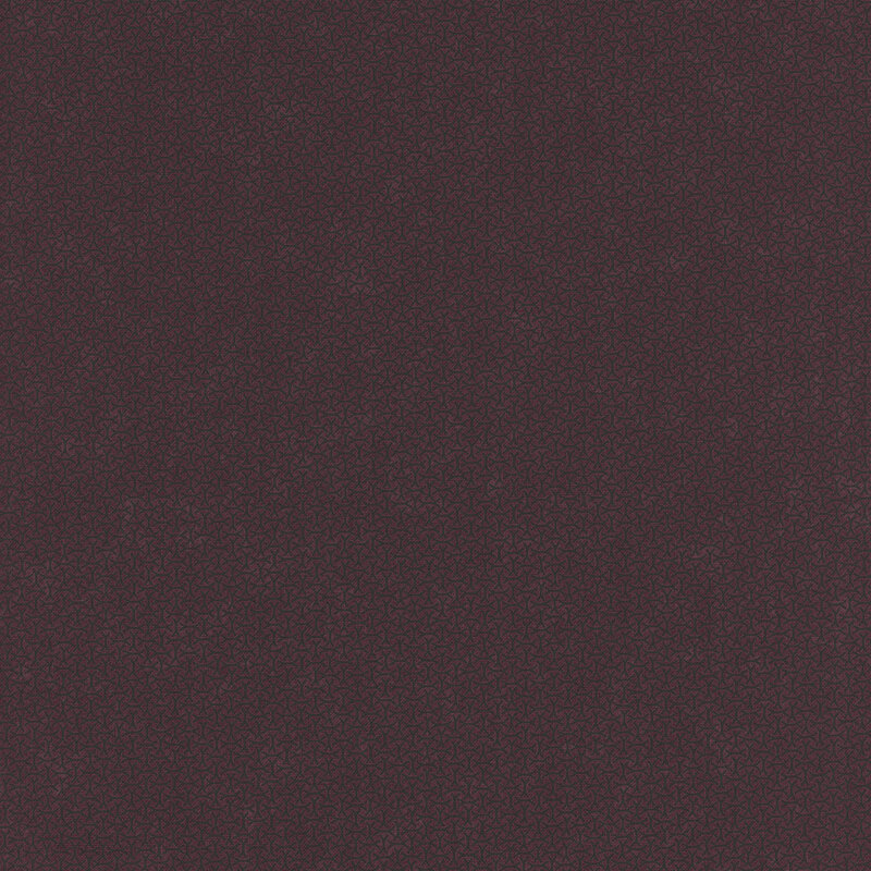 A mottled mulberry purple fabric with an arrangement of abstract tonal lines. 