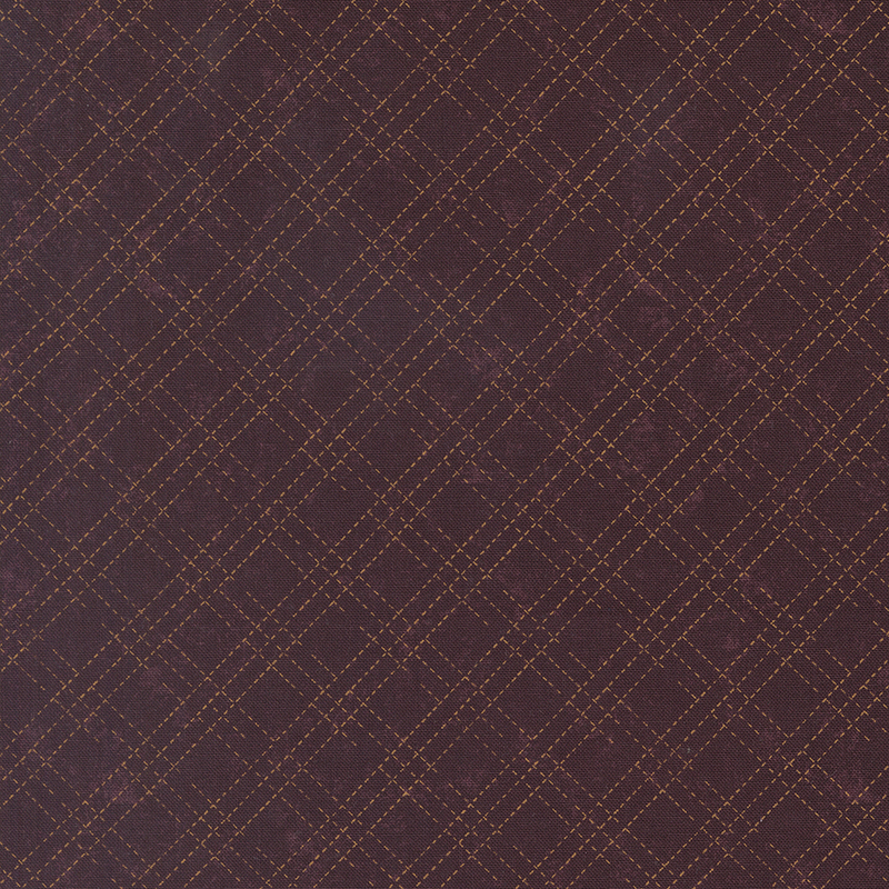 A mottled mulberry purple fabric with an orange stitched plaid design. 