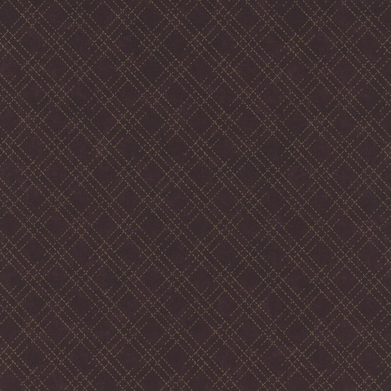 A mottled mulberry purple fabric with an orange stitched plaid design. 