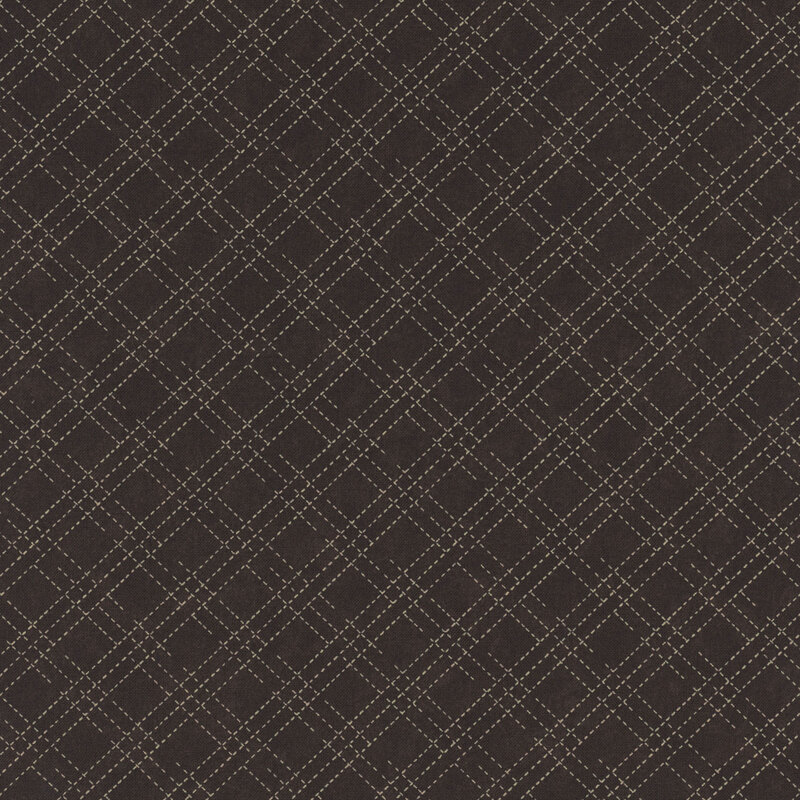 A mottled earthy brown fabric with an cream stitched plaid design. 
