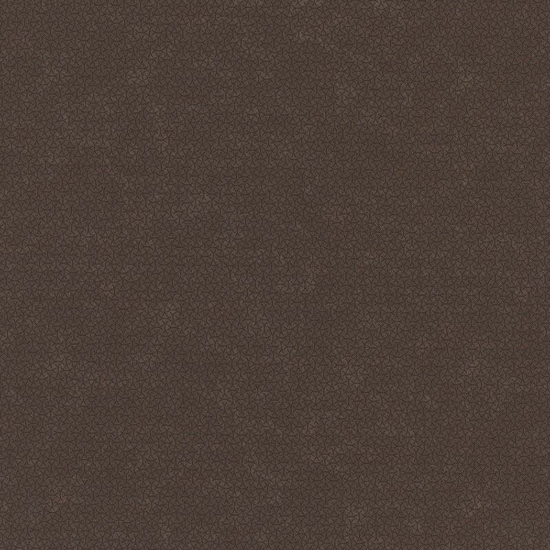 A mottled earth brown fabric with an arrangement of abstract tonal lines. 