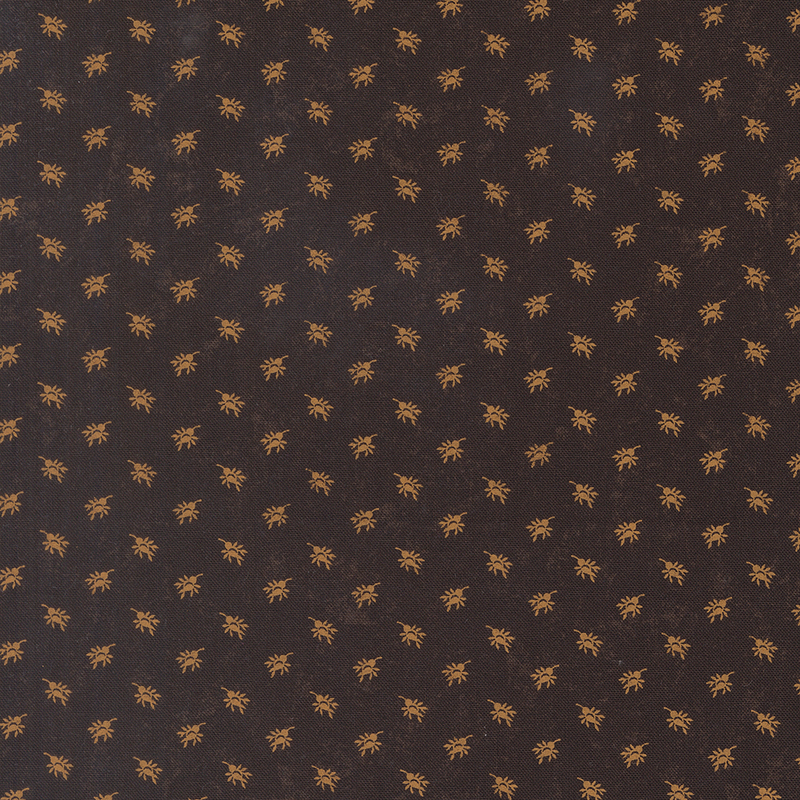 A mottled earthy brown fabric with orange rosebud sprays. 