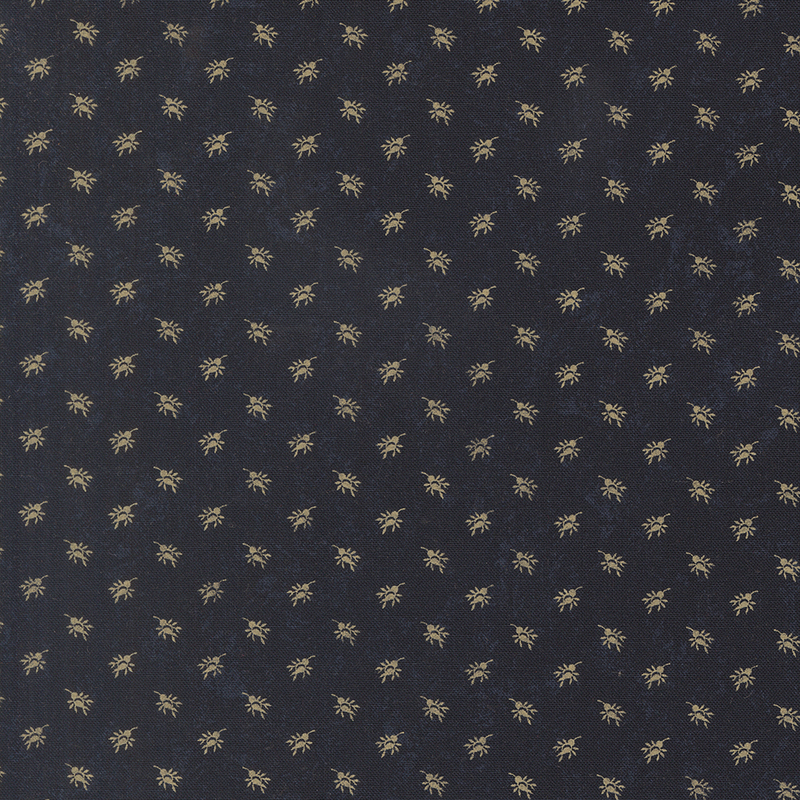 A mottled indigo blue fabric with cream rosebud sprays. 
