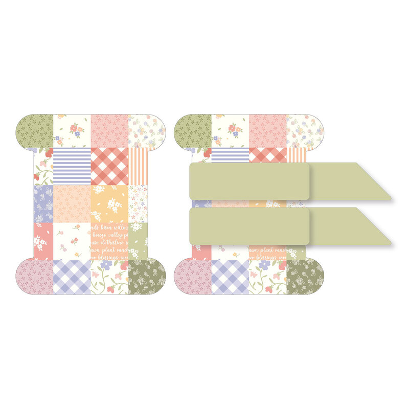 A digital image of a large binding holder with a patchwork design of various fabrics from the Pastel Prairie fabric collection.