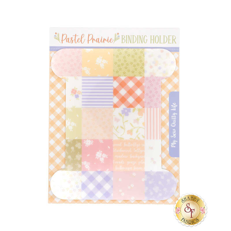 A image of a large binding holder with a patchwork design of various fabrics from the Pastel Prairie fabric collection.