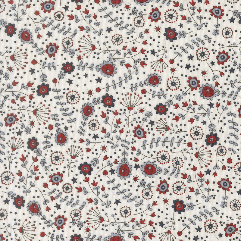 cloud white fabric featuring tossed stars, flowers, leaves, and stems in red, cornflower blue, and navy blue