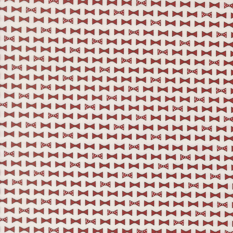 diagonal rows of bowties in red and red with white polka dots on cloud white fabric