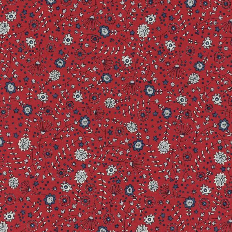 dark red fabric featuring tossed stars, flowers, leaves, and stems in light gray, cornflower blue, and navy blue