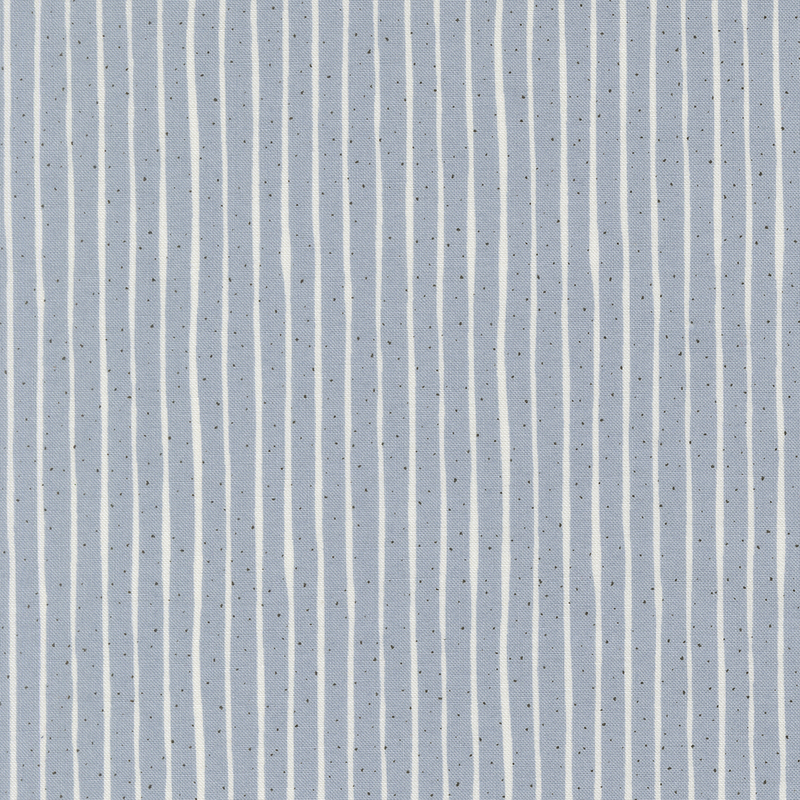 faded denim blue fabric featuring white pinstripes and navy pindots