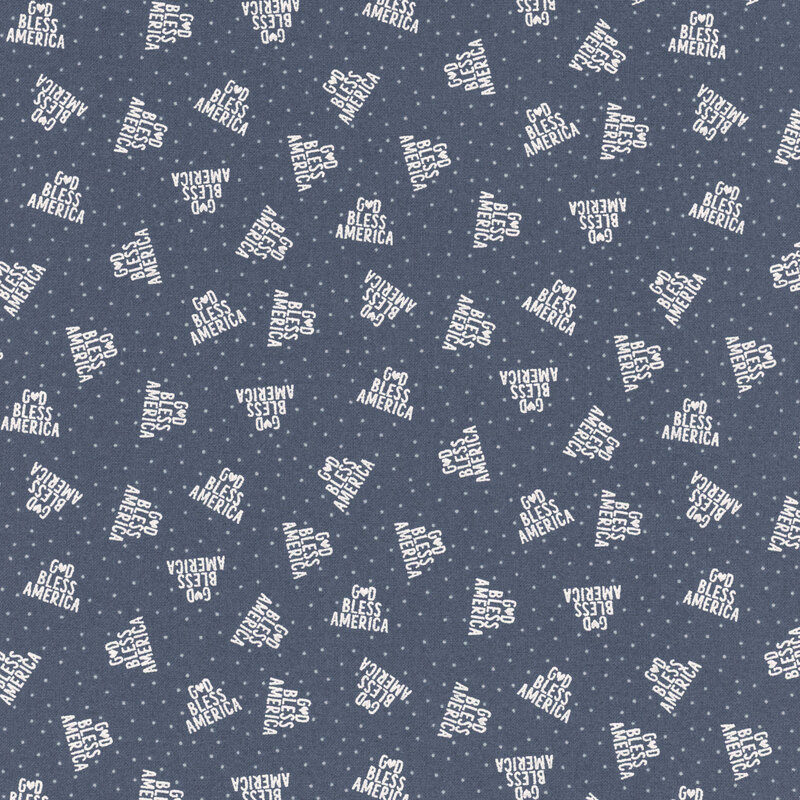 navy blue fabric featuring God Bless America in a triangle of white text on a background of white polka dots