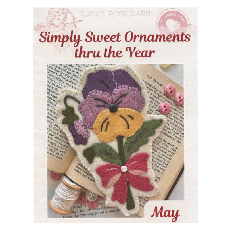 Front cover of the pattern showing the completed project on resting on an open book.