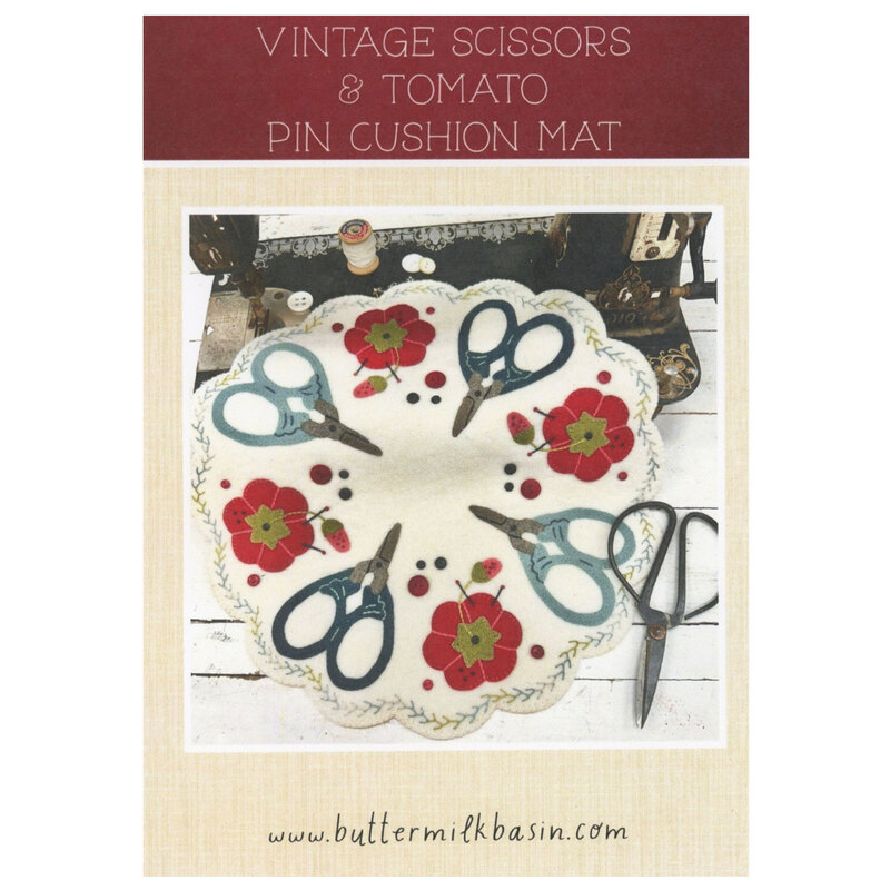 Front cover of pattern, showing the completed project on a sewing table.