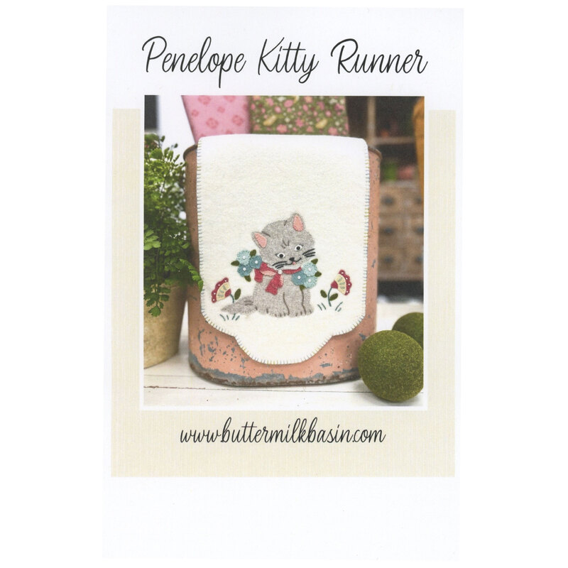 Front cover of pattern, showing the completed project on a rustic garden planter.