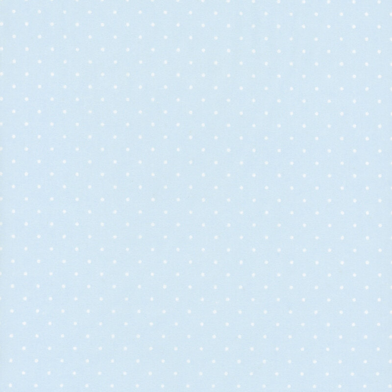 Powder blue fabric with white polka dots.