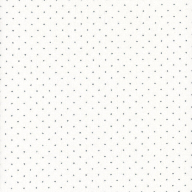 White flannel fabric with cool gray polka dots.