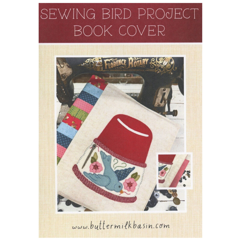 The front cover showing an showing the completed book cover pattern with sewing thimble, bird, flowers, and a threaded needle.