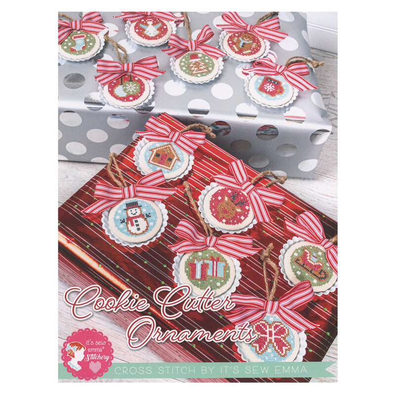 The front of the Cookie Cutter Ornaments pattern book by its sew Emma featuring examples of all 12 projects in the book.  