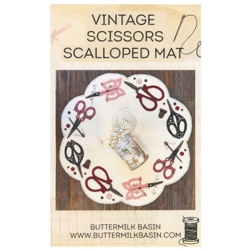 Front cover of pattern, showing the completed project on a rustic wood surface.