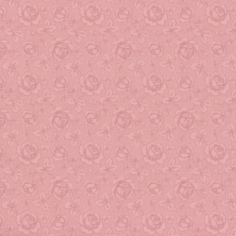 Tonal rose-pink fabric featuring tossed roses and leaves on a textured background
