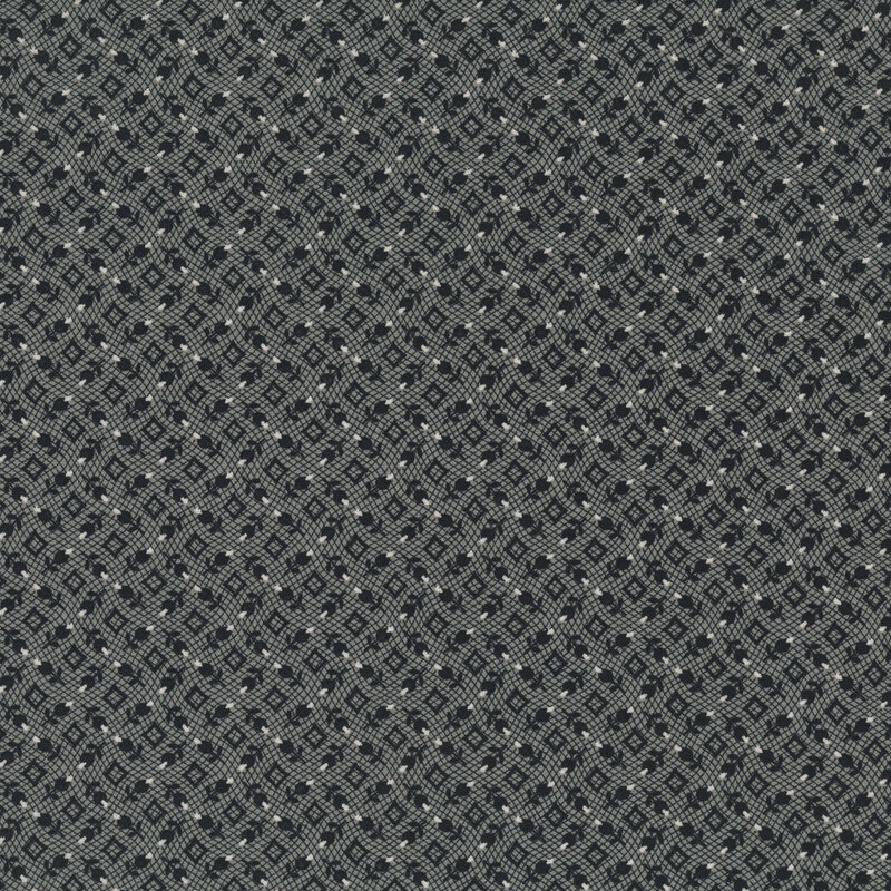 Gray fabric with a tossed pattern of black florals and geometric diamonds.