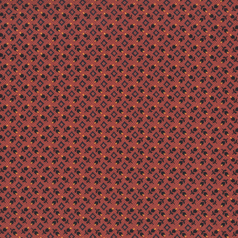 Orange fabric with a tossed pattern of black florals and geometric diamonds.