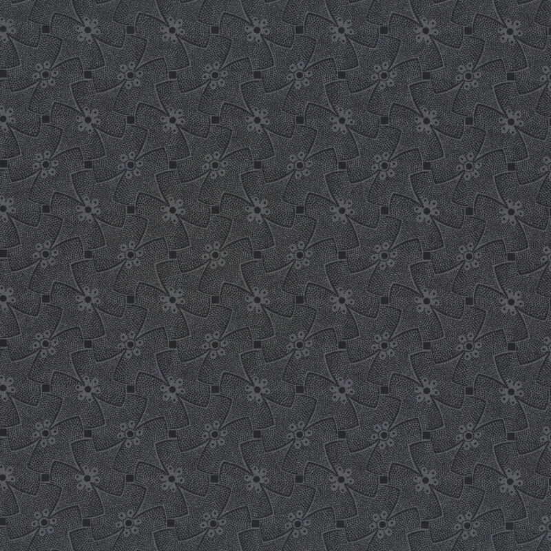 Tonal black fabric with an abstract floral pattern with geometric elements.