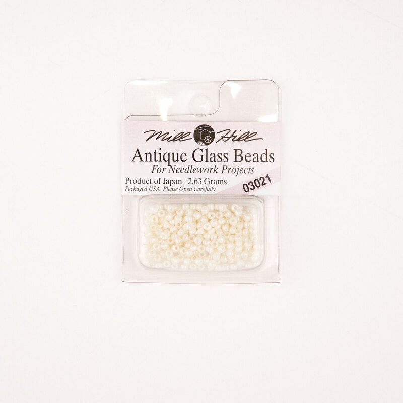 A package of Mill Hill Antique Seed Beads in the color royal pearl. 