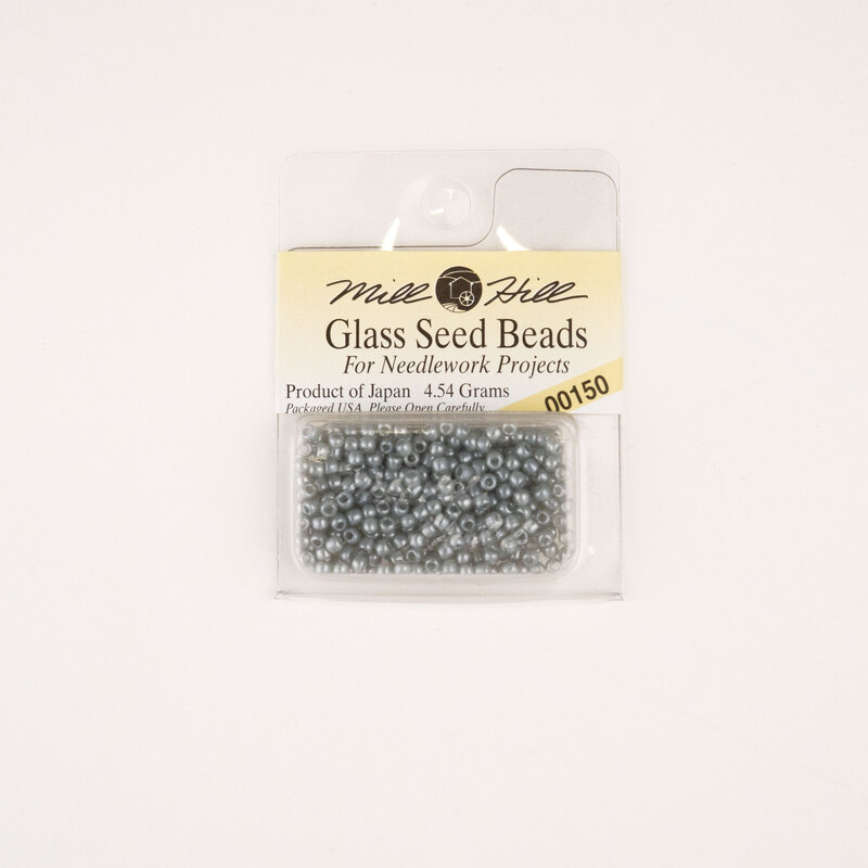 A package of Mill Hill Glass Seed Beads in the color grey. 