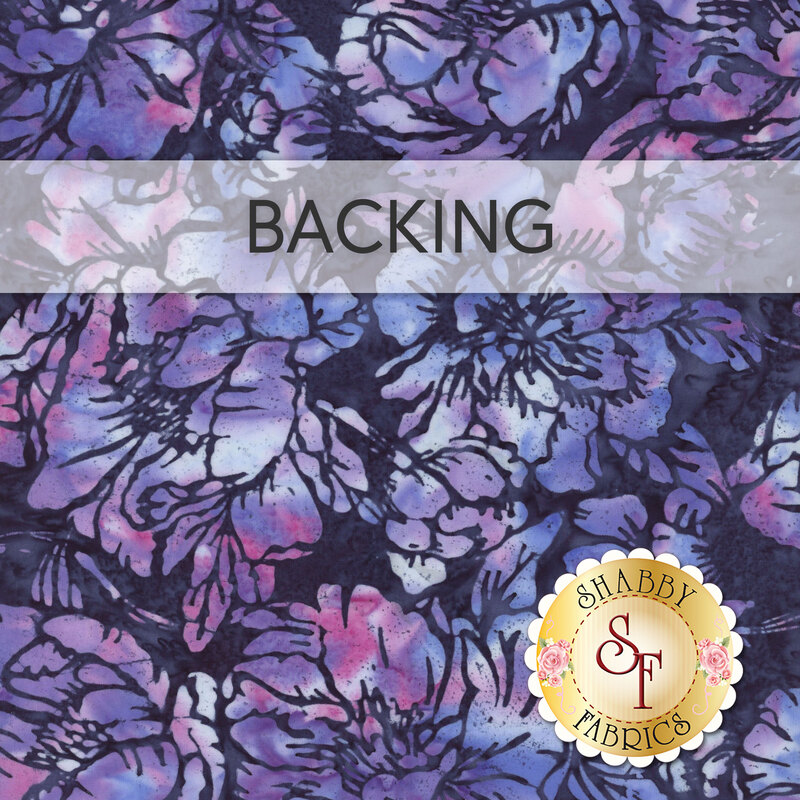 A swatch of purple batik fabric with large watercolor florals in pink, blue, and purple. A banner at the top reads "Backing" and a golden Shabby Fabrics logo sits in the bottom right corner.