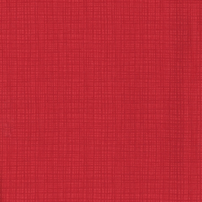 A tonal red fabric with a textured background.