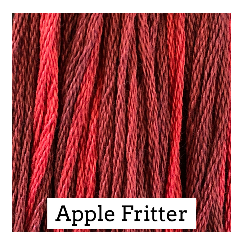 A variegated red swatch of Classic Colorworks floss.