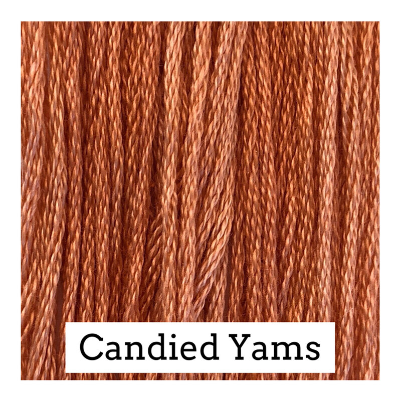 A coral pink swatch of Classic Colorworks floss. 