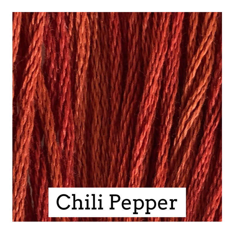 A red orange swatch of Classic Colorworks floss. 
