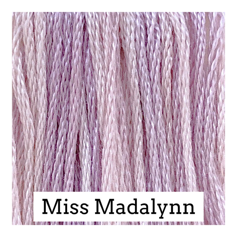 Swatch of pink and purple threads