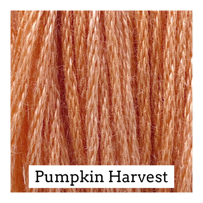 Swatch of light pumpkin colored threads