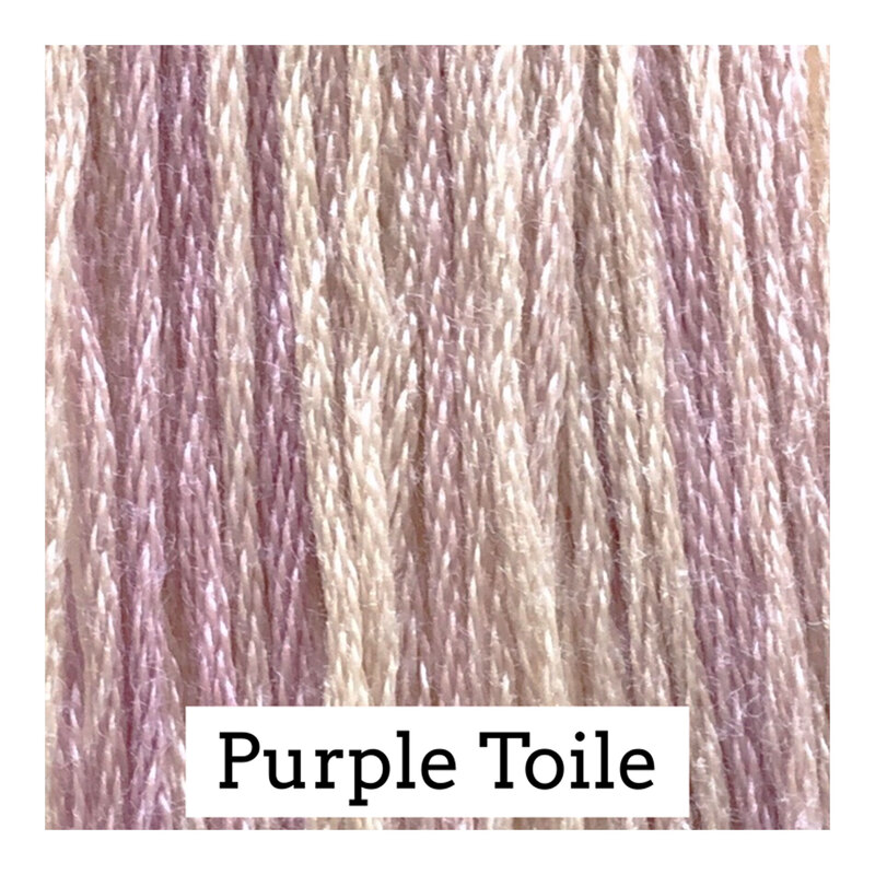 A variegated swatch of Classic Colorworks floss in the colors cream and pastel purple.