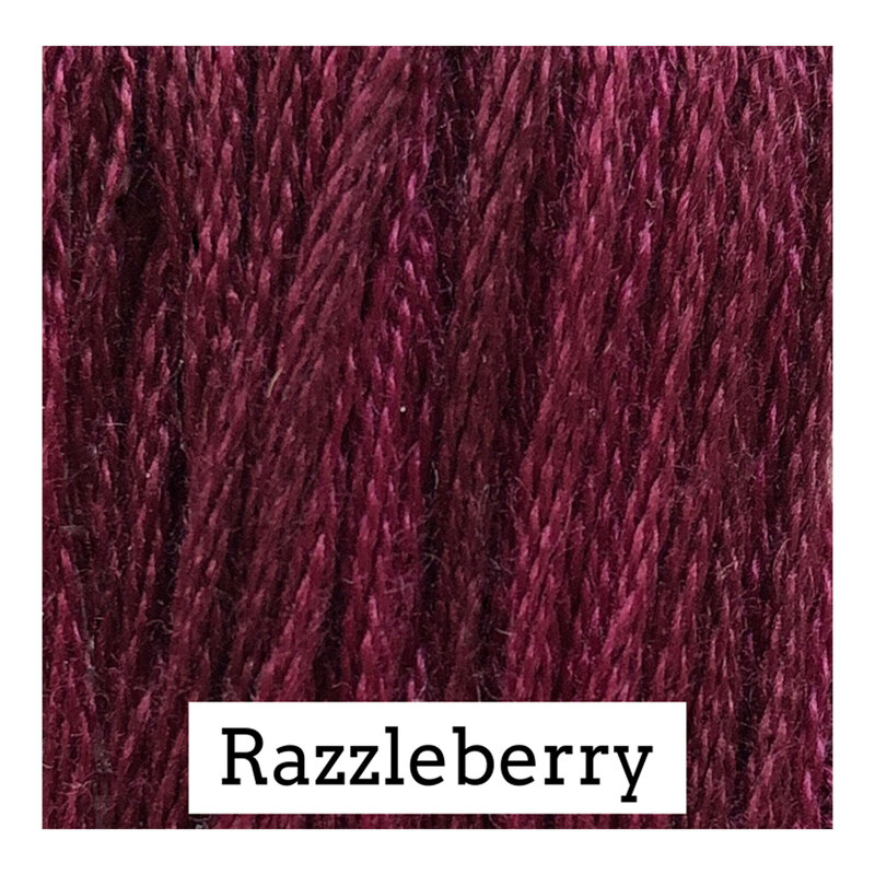Swatch of burgundy colored threads