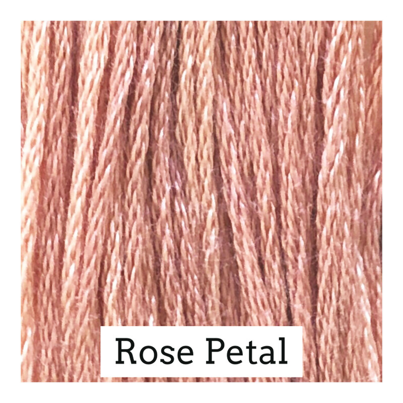 Swatch of coral pink colored threads