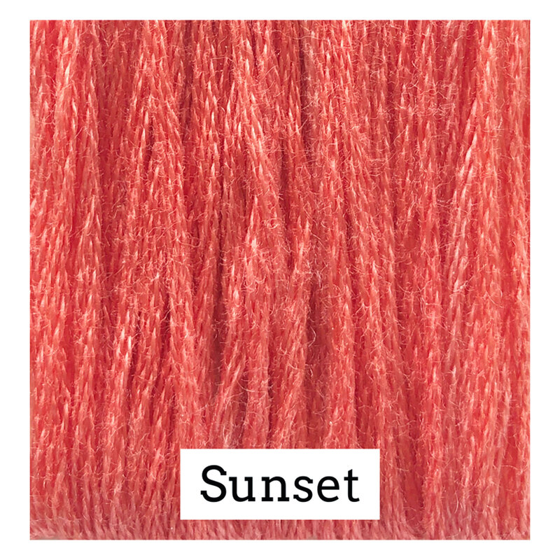 Swatch of coral colored threads