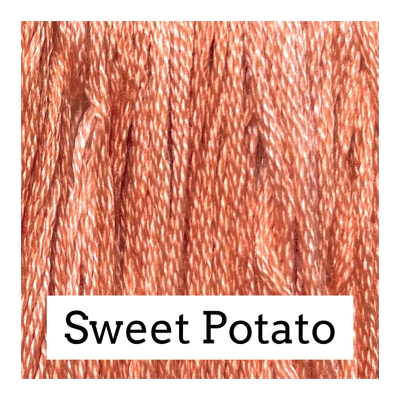 Swatch of soft orange colored threads