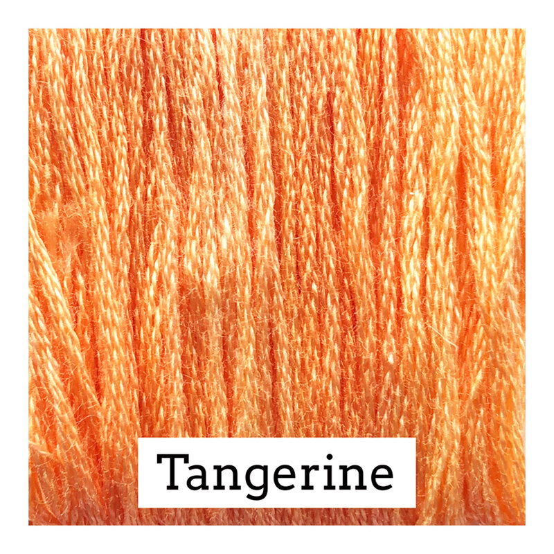 Swatch of bright orange colored threads