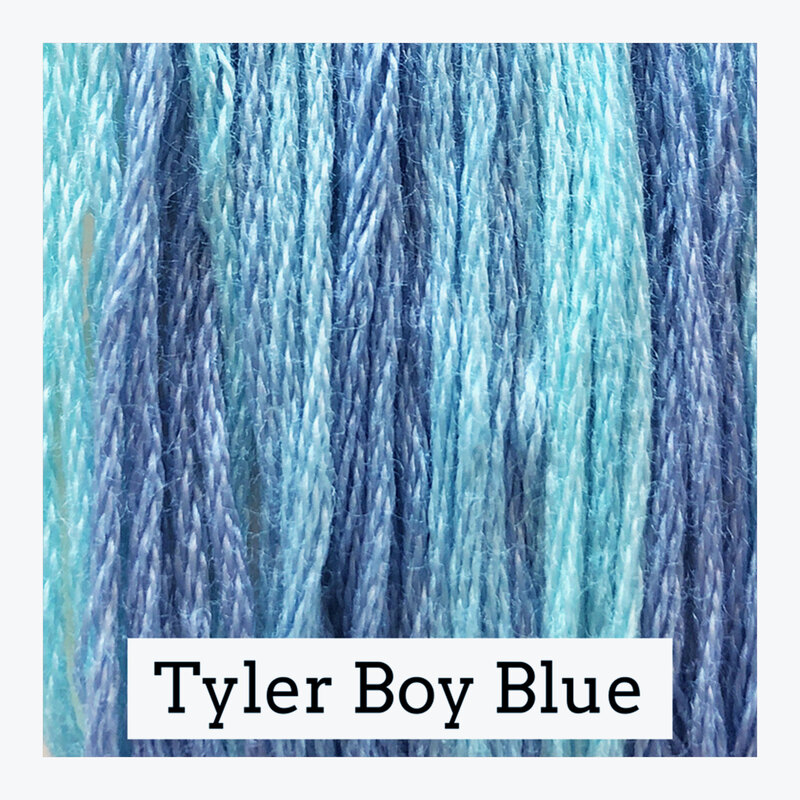 A variegated swatch of Classic Colorworks floss in the colors blue and light blue.
